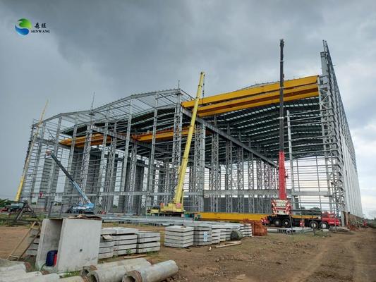 โกดังโครงสร้างเหล็กแผงแซนวิชใยแก้ว สร้างตามมาตรฐานการรับแรงลมแบบกำหนดเอง พร้อมการออกแบบกันน้ำสูง