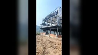 คลังสินค้าโครงสร้างเหล็กแบบกำหนดเองโซลูชั่นการจัดเก็บอุตสาหกรรมที่ทนทาน